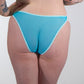 Person wearing a light blue lingerie against a plain background