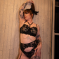 black lace bra with chains on a white background