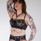 black lace bra with chains on a white background